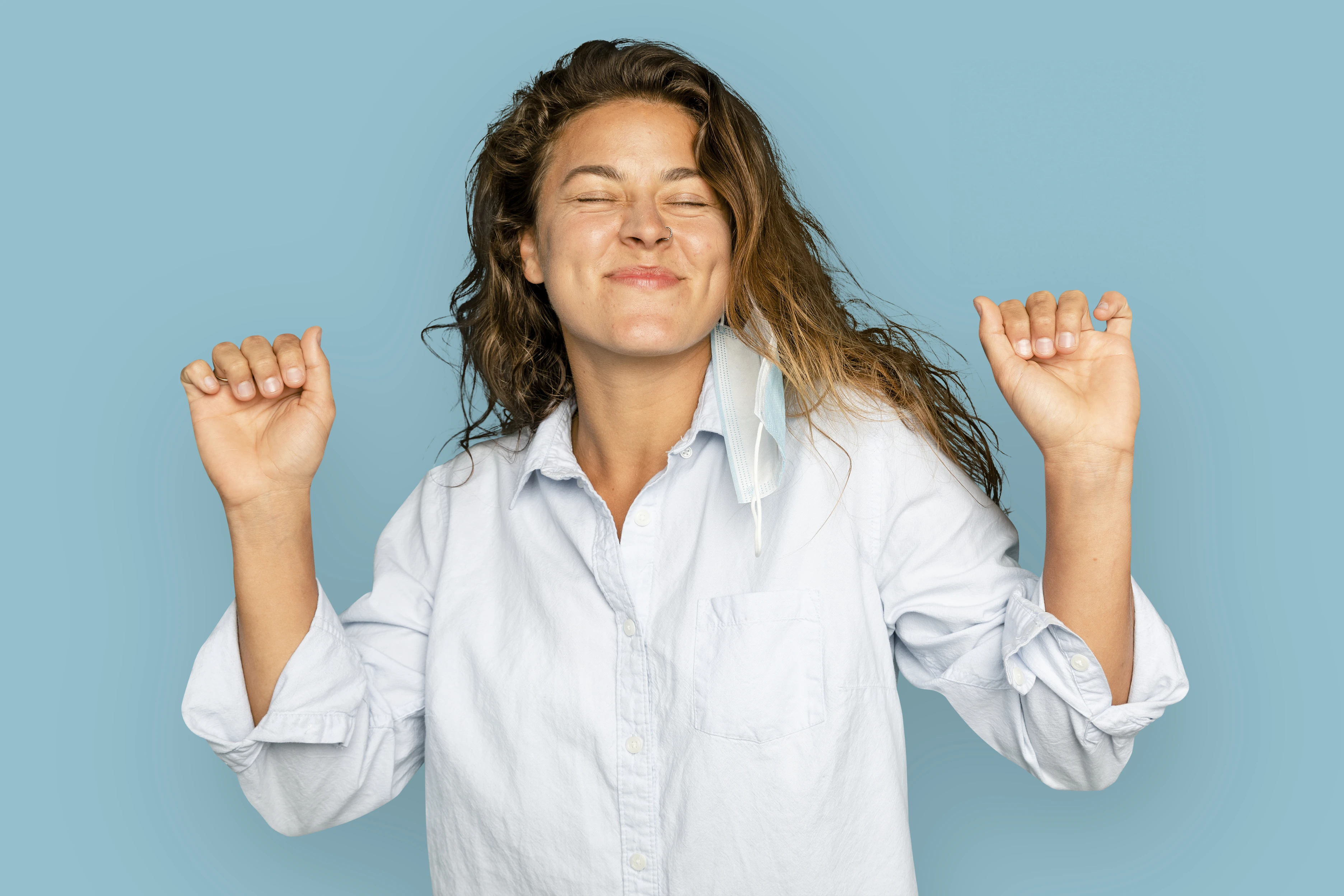 140-joyful-woman-dancing-on-blue-background-1726777732792.jpg